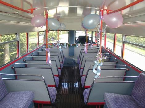 Routemaster upper saloon interior, with blue and pink decorations