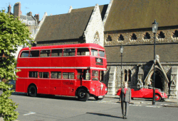 Red sports car and red bus - St Simon Zelotes Church, Chelsea