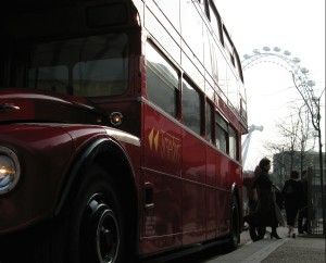 Passengers alight beside the London Eye